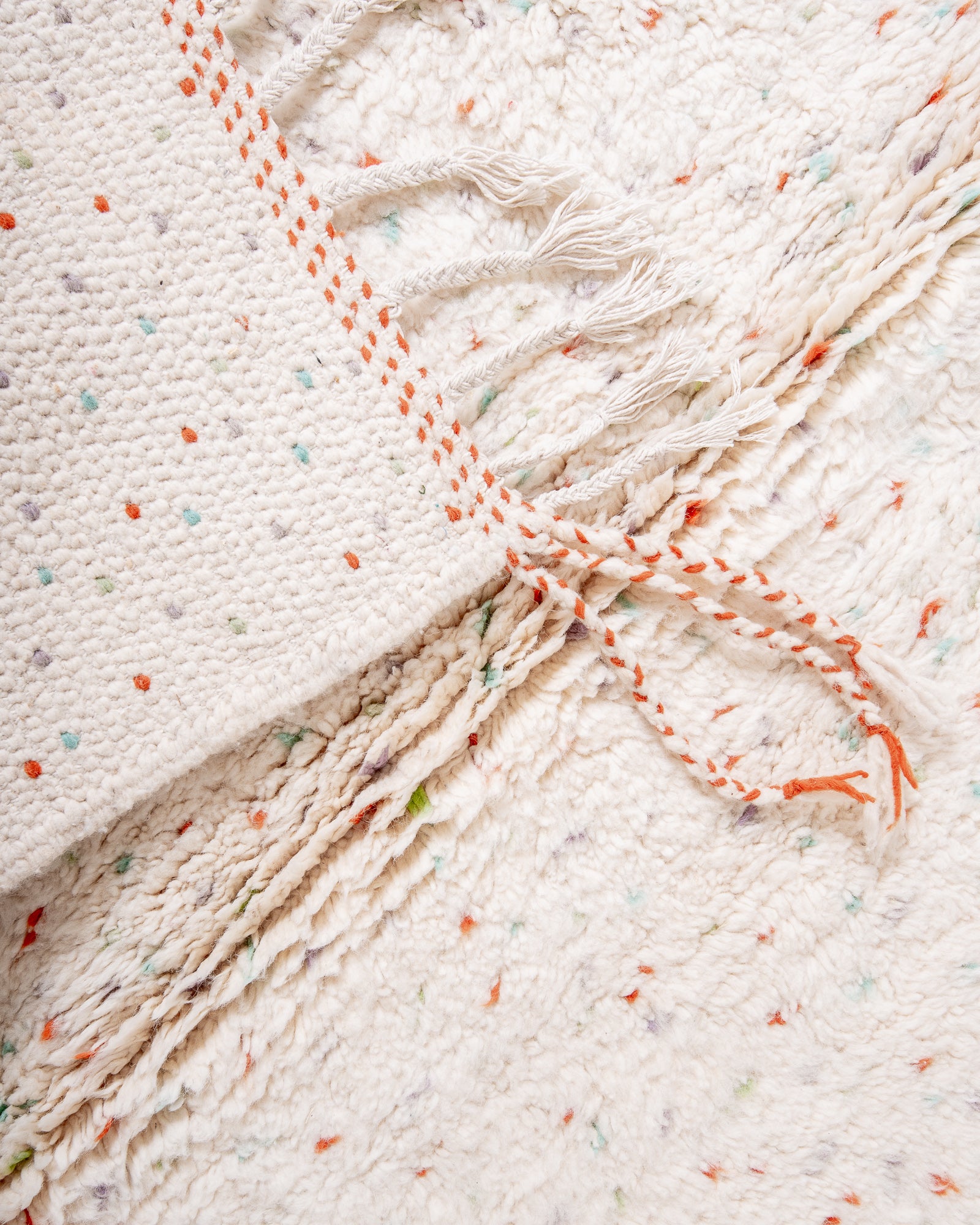 Modern, designer, handcrafted Berber rug from Morocco. Beniourain carpet with beautiful colours and patterns and fluffy wool texture.